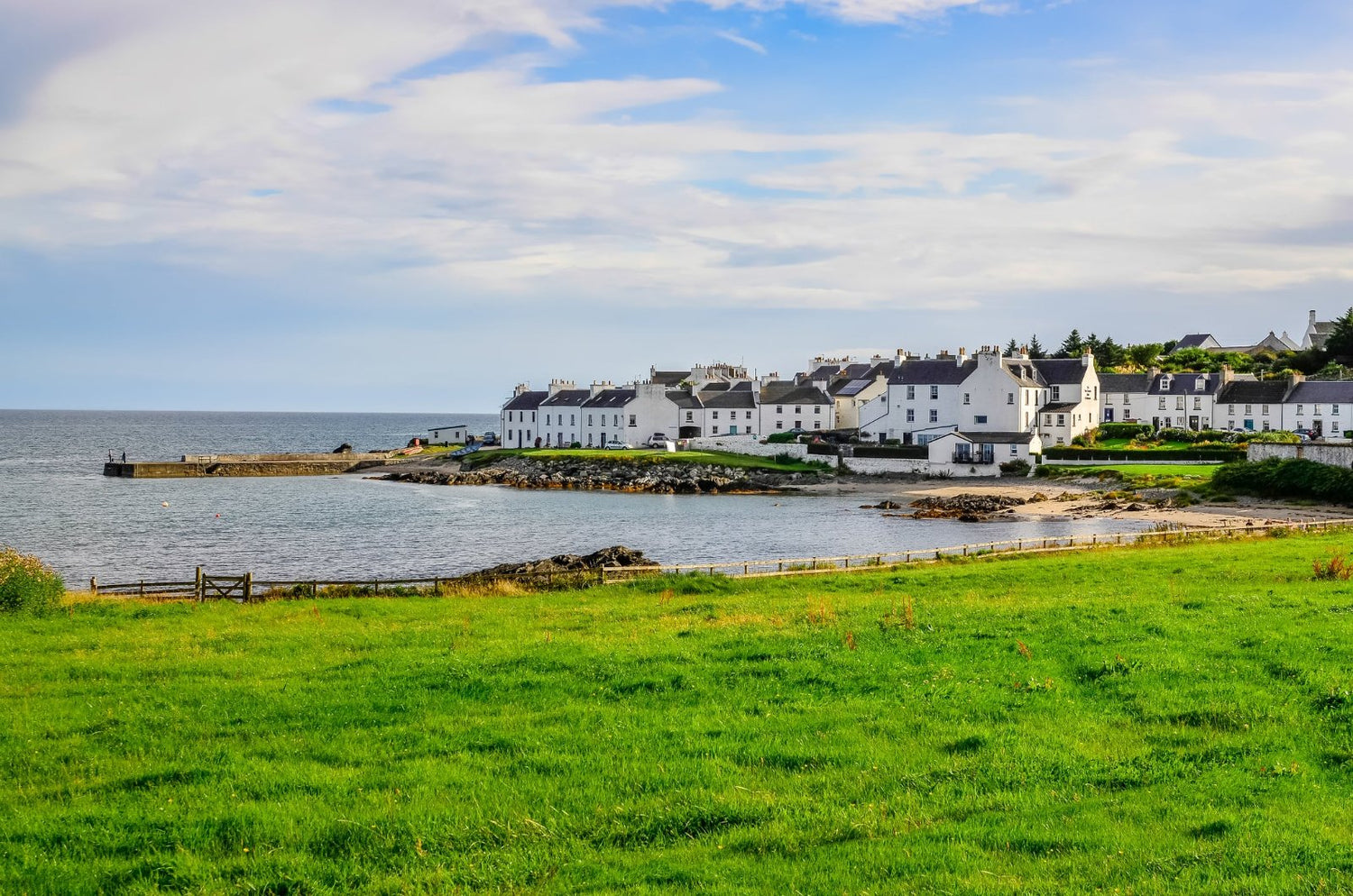 A picture of a coastal town in Islay, Scotland. 